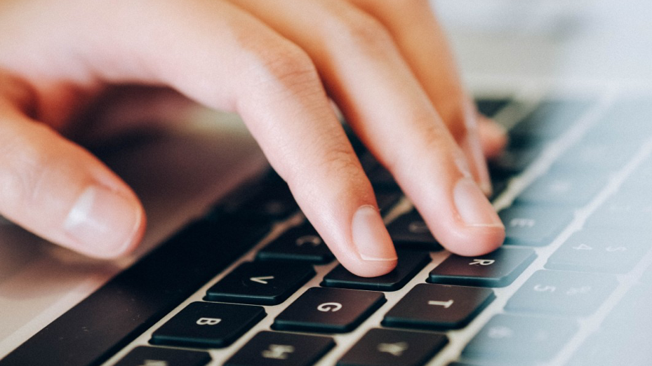 Fingers on keyboard